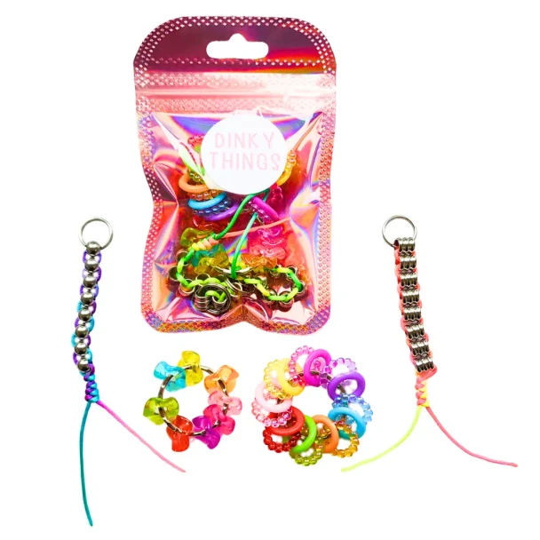 Dinky Things Fidgets - Mini Fidget Kit contains four favourites in mini size! Kit includes Mini Clicky Ring, Wave, Metal Barrell Roller & Metal Roller.