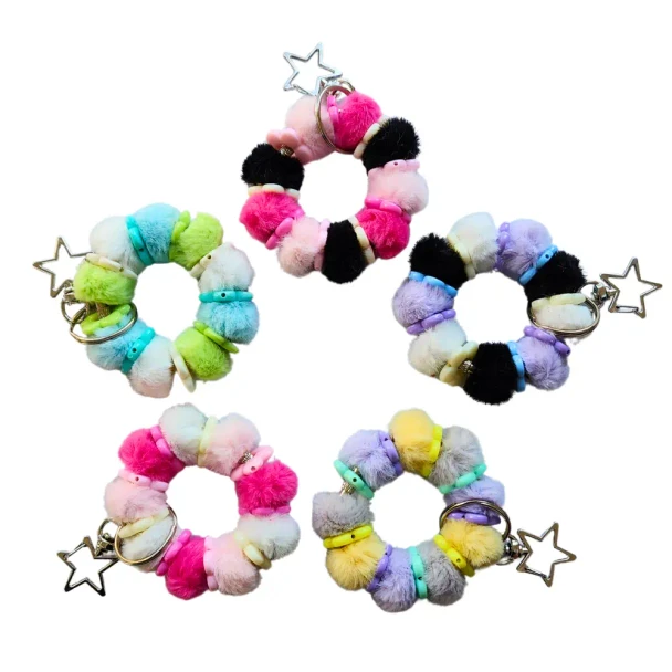 Meet the Dinky Things XL Fidgets - Fluffy Keychain, a soft tactile fidget with fluffy beads, colourful flower beads, a flexible wire centre and star keychain clip.