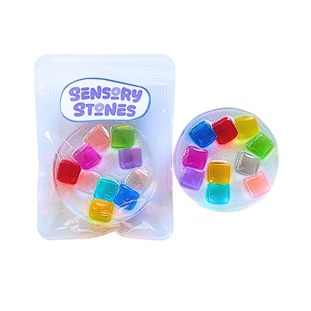 Handmade Sensory Stones - Rainbow Blocks Fidget by Sensory Oasis for Kids, featuring sparkly resin and colourful raised rainbow block details for tactile sensory fun.