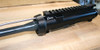 Left side of the upper receiver assembly for the BCM® BFH 16" Mid Length Complete Upper Receiver.