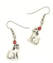cat with red bead earrings