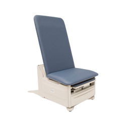 Brewer FLEX Access exam table in light blue upholstery and off-white base, shown in upright seated position with ergonomic design and built-in storage drawers.