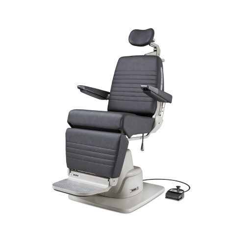Reliance 6200H ENT exam chair displayed at an angle, shown in a semi-reclined position with dark gray upholstery, adjustable headrest, padded armrests, integrated side control panel, and footrest; connected to an external foot pedal control on the floor.