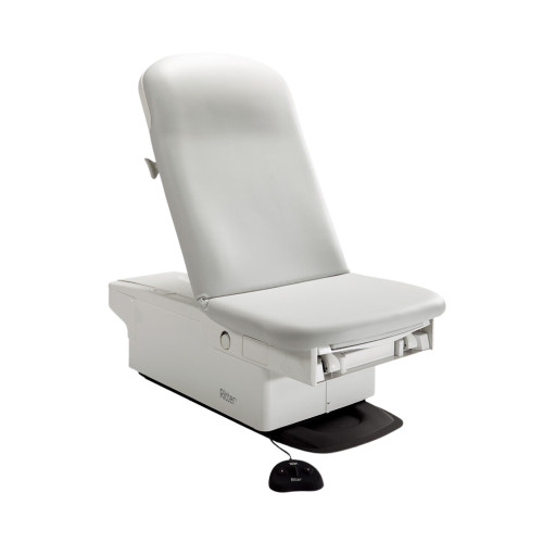 Midmark Ritter 224 barrier-free power examination table with light gray upholstery and foot control.