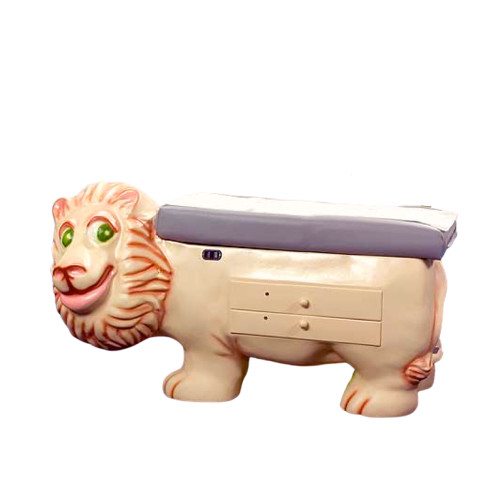 Pediatric exam table designed to look like a friendly cartoon lion with a gray cushioned top and built-in drawers.