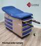 Midmark Ritter 304 examination table with blue upholstery and matching blue-accented drawers, featuring extended stirrups in a medical exam room.