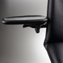 Close-up of a black adjustable armrest attached to a Midmark 647, showcasing its ergonomic design and support structure.