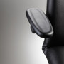 Close-up of a black adjustable armrest attached to a Midmark 647, showcasing its ergonomic design and support structure.