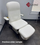 Refurbished Midmark 647 with bone upholstery, and a foot control in a clinic room.