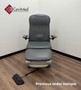 Refurbished Midmark 647 with cruiser gray upholstery, and a foot control in a clinic room.