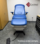Refurbished Midmark 647 with pacific blue upholstery, and a foot control in a clinic room.