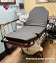 Refurbished Stryker 1061 in a clinic room with a black mattress.