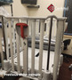 Refurbished Stryker cub pediatric crib stretcher in a clinic room.