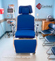 Refurbished TransMotion Medical TMM5 in a medical room with blue mattress.