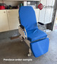 Refurbished TransMotion Medical TMM4 in the garage of a house with a blue mattress.