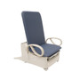 Brewer FLEX Access exam table in seated position with blue upholstery and light beige swing-arm supports, designed for patient accessibility and comfort.
