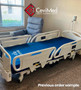Refurbished Stryker FL28C in a clinic room with a blue mattress.
