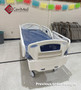 Refurbished Stryker FL28C in a clinic room with a blue mattress.