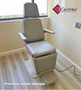 Midmark 491 refurbished ENT chair with pearl gray upholstery in a medical room.