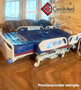 Refurbished Hill-Rom TotalCare P1840 in a bedroom with a blue mattress.