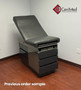 Refurbished gray Midmark 104 exam table refurbished, ready for patient care.