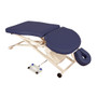 Eggplant Oakworks PT400M Physical Therapy Table with ergonomic cutouts, adjustable face cradle, and foot pedal control on a white metal scissor-lift base with wheels.