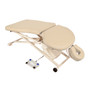 Cream Oakworks PT400M Physical Therapy Table with ergonomic cutouts, adjustable face cradle, and foot pedal control on a white metal scissor-lift base with wheels.