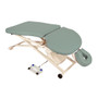 Gray Oakworks PT400M Physical Therapy Table with ergonomic cutouts, adjustable face cradle, and foot pedal control on a white metal scissor-lift base with wheels.