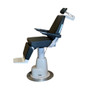 Side view of a black Reliance 7000 ENT exam chair in semi-reclined position, featuring adjustable armrests, headrest, footrest, and control panel on the chair's side.