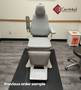 MTI 423 Power ENT Chair in light gray upholstery, shown in a clinical setting with wood-look flooring, a black floor mat, and a nearby biohazard container marked in red and white.