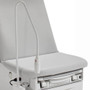 Close-up of Midmark Ritter 224 Barrier-Free Examination Table featuring a mounted flexible medical examination light on the side.