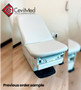 Midmark 225 Barrier-Free examination table with light gray upholstery, shown in a medical exam room setting, plugged in and ready for use.