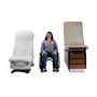 Wheelchair user between a Midmark 626 exam chair and a standard exam table.