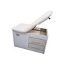 Brewer exam table with white upholstery, dual drawers, and adjustable backrest.