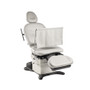 Midmark 630 HumanForm chair with privacy drape and adjustable leg section.