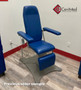 UMF 8678 refurbished chair with pacific blue in a medical room.