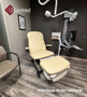 Refurbished Midmark 647 with mushroom upholstery in a clinic room.