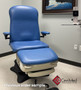 Blue Midmark 647 with armrests in a clean medical exam room.