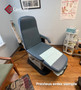 Refurbished Midmark 647 with classic blue upholstery in a clinic room.