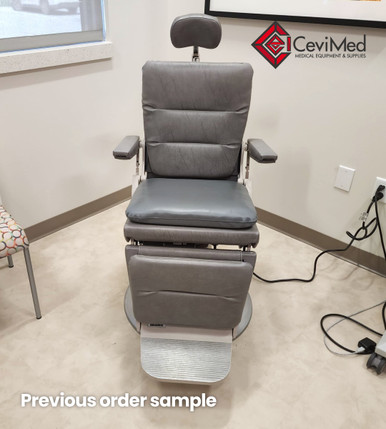 Reliance 980 ENT procedure chair in a textured gray finish, shown in a medical exam room with headrest, armrests, footrest.