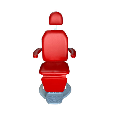 Global SMR MAXI 2800 exam chair in vibrant red upholstery with padded armrests and adjustable headrest, upright position on a gray circular base with a textured footrest.