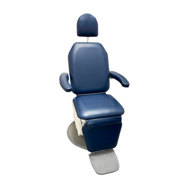 Global SMR MAXI 2800 exam chair in dark blue upholstery with contoured armrests and adjustable headrest, positioned upright on a gray circular base with a matching textured footrest.