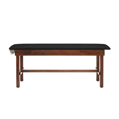 Ritter 95 treatment table with black upholstered flat top, and wooden frame.