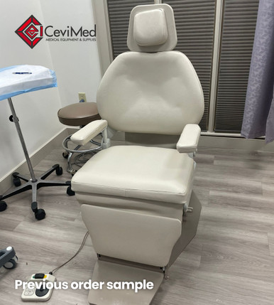 Midmark Ritter 391 ENT exam chair with beige upholstery, headrest, and armrests in exam room.