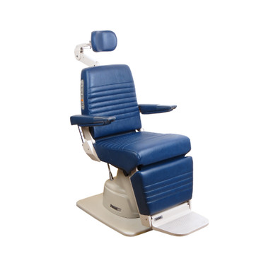 Reliance 7000 ENT exam chair in blue upholstery with horizontal stitching, padded armrests, adjustable headrest, and a sturdy beige base with footrest.