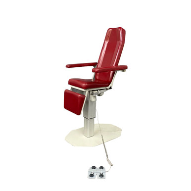 Red UMF 8678 power phlebotomy chair in upright position with padded armrests, footrest, and a rectangular base, featuring a connected foot control panel.