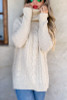 Ivory sweater braided detail design very flattering side slits at the hips, high neck or fold down. Super soft, longer sweater sits below the hips and longer sleeves for that ultra coziness.