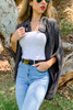 Two toned color mixed poncho cardigan with clip holder button, black and grey color.