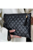 Black quilted tassel clutch bag purse