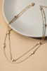 Two row delicate chain with metal beads and star charms stationed gold tone